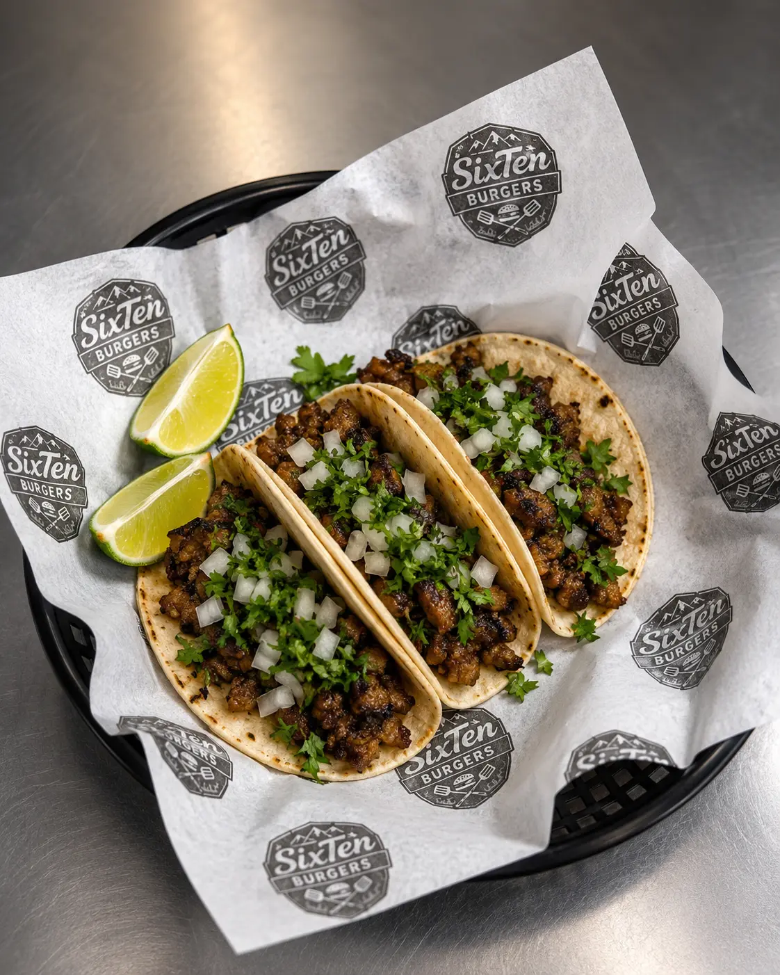 Tacos with onions, cilantro and lime